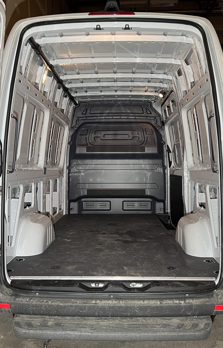 Before — disorganized van interior